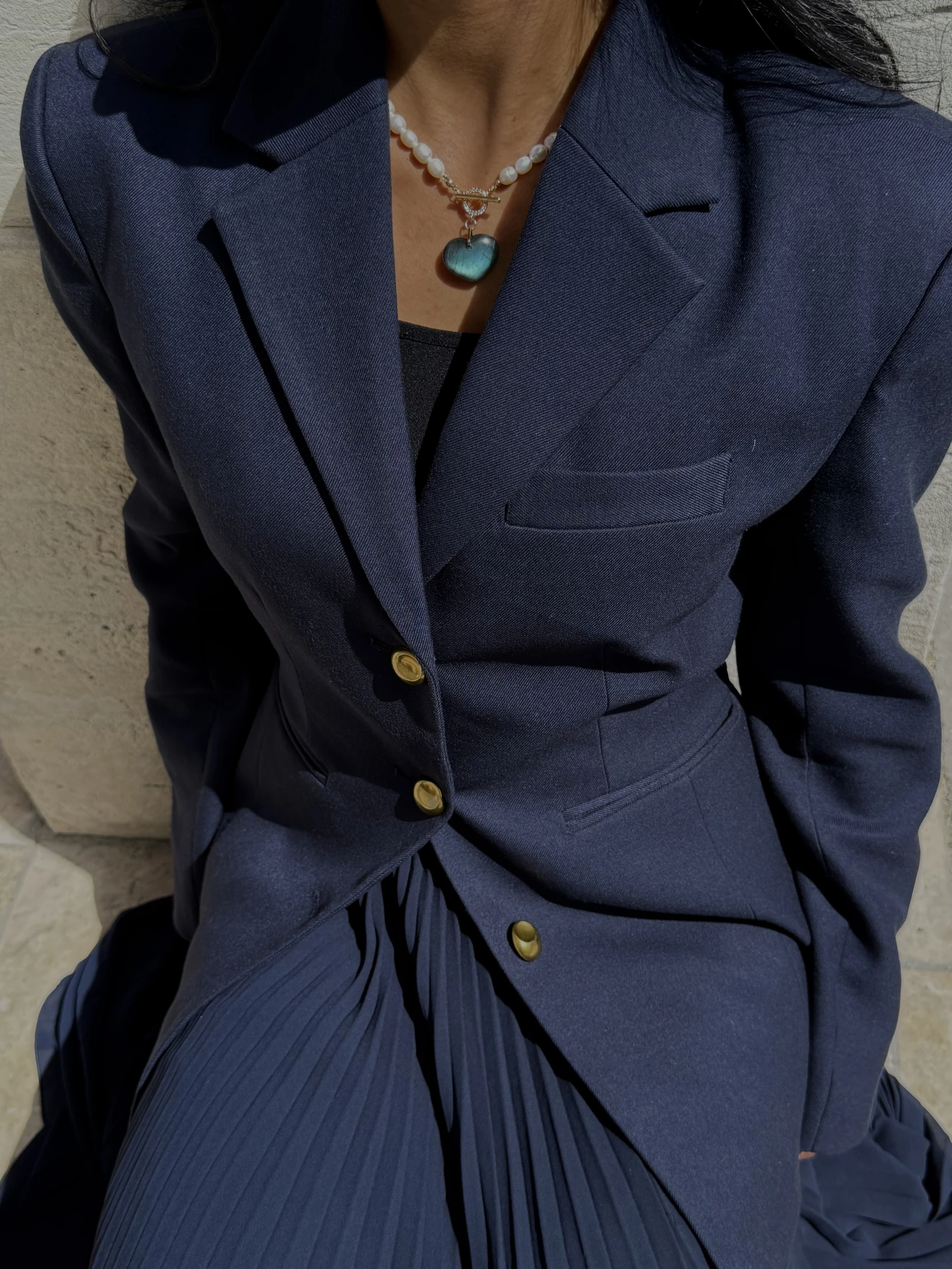 Labradorite heart necklace with navy blazer